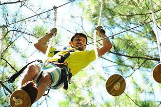 Our most challenging aerial trail, Commando, puts a climber's strength and skills to the test. (Photo by Tim Curtis.)