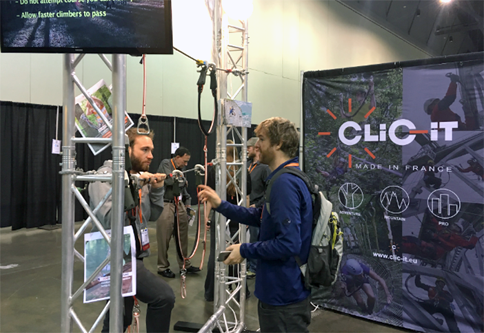Attendees check out CLIC-iT's continuous belay system.